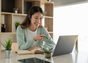 Home care provider reviewing compliance documentation and care plans on a tablet during a client visit